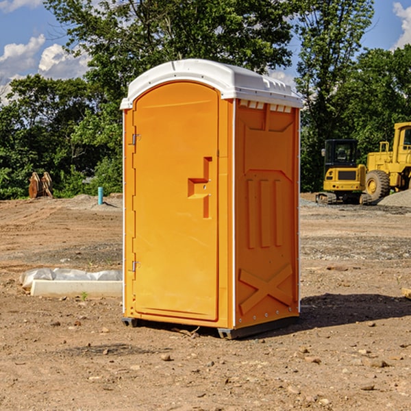 how often are the porta potties cleaned and serviced during a rental period in Chamita